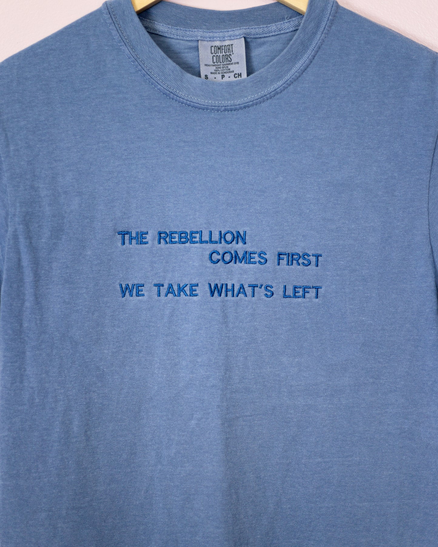 Rebellion Comes First Quote Tee